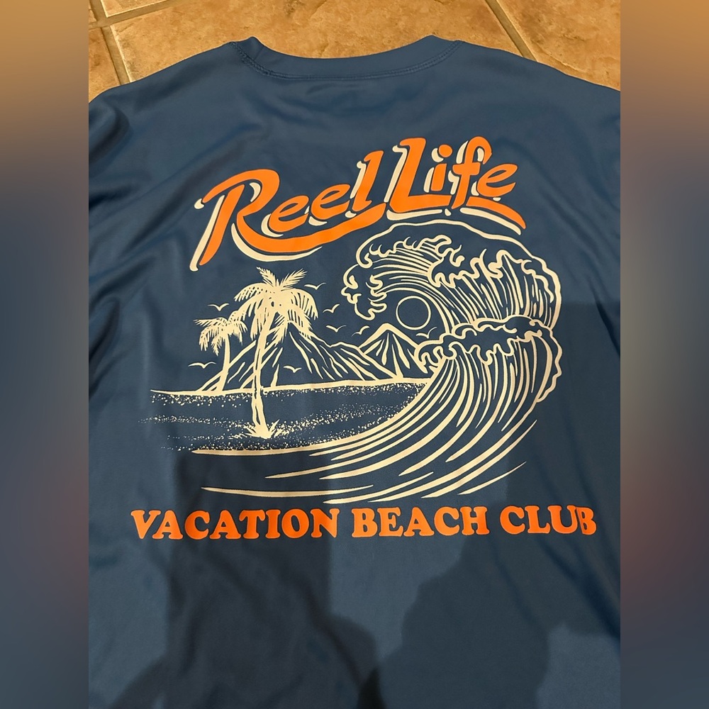 Reel Life men’s medium performance shirt